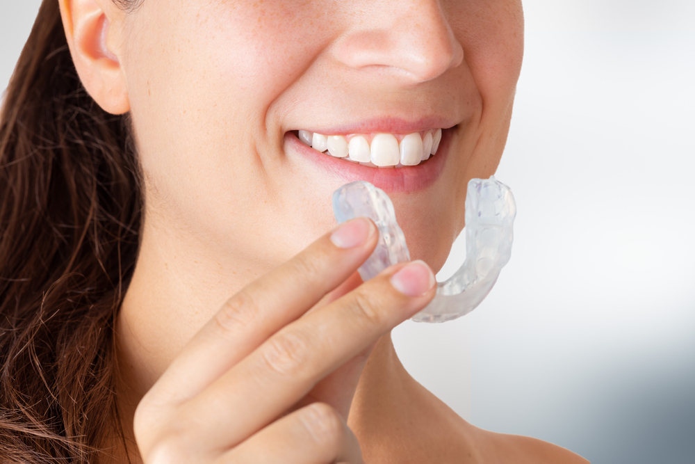 Woman-with-mouth-guard-for-grinding-teeth.
