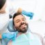 Man at Dental Appointment - Comprehensive Dental Restorations and Dental Implants in San Diego, CA