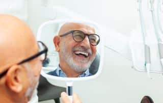 How Dental Implants Improve Speech and Chewing