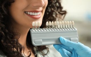 How Porcelain Veneers Improve the Look of Chipped or Stained Teeth